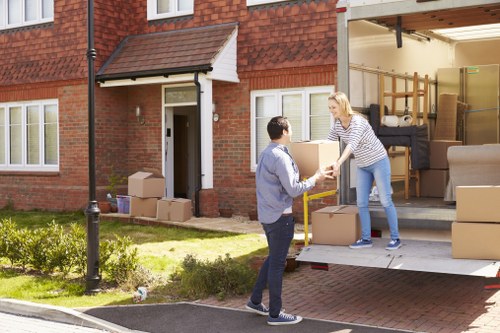 Local removals team handling furniture loading for a short-notice move in Uxbridge