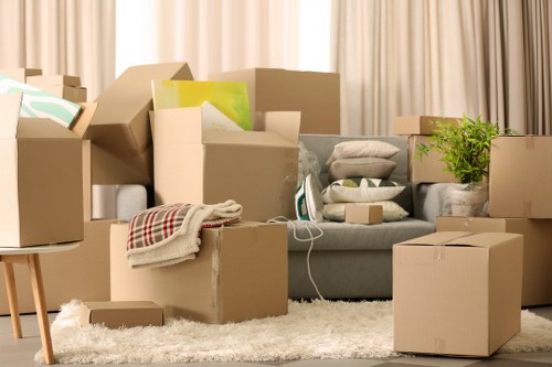 Packed boxes and furniture ready for a flat removal service in Uxbridge