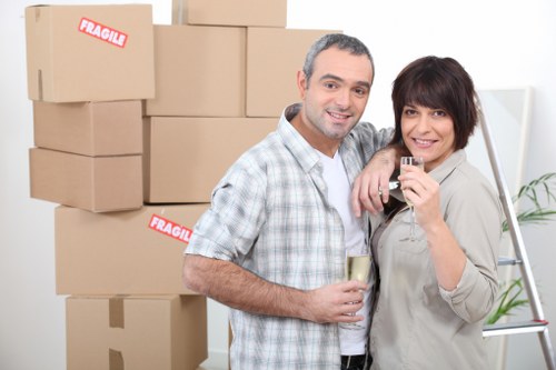 Professional movers handling furniture during a home move in Uxbridge